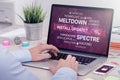 Installing update against meltdown and spectre threat on laptop in office space Royalty Free Stock Photo