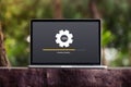 Installing update process with gearbox percentage progress and loading bar on laptop / computer screen concept Royalty Free Stock Photo