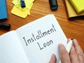 Installment Loan is shown on the conceptual business photo