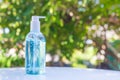 Instant antiseptic hand sanitizer mist spray, antibacterial alcohol liquid.Alcohol gel green bokeh background, Used to gel Royalty Free Stock Photo