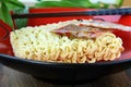 Instant Asian noodle fast food with chopsticks