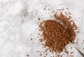 Instant coffee beans in a spoon Royalty Free Stock Photo
