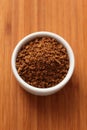 Instant coffee granules in a bowl Royalty Free Stock Photo