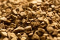 Instant coffee granules close - up-aromatic background. Brown pattern of instant coffee