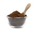 Instant coffee powder with glass bowl and wooden spoon isolated on white background Royalty Free Stock Photo