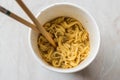 Instant Curry Flavored Ramen Noodles served with Chopsticks. in Plastic Cup Royalty Free Stock Photo