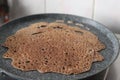 Instant Finger Millet Dosa, made with finger millet flour, curd and spices. Cooked on a saute pan or hot skillet for a few minutes