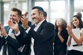 Instant gratification. a group of businesspeople applauding during a seminar in the conference room.