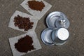 Instant, ground coffee and coffee beans. Details of a Vietnamese coffee maker. Against the background of coarse linen fabric. Royalty Free Stock Photo