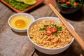 Instant noodle in bowl cooked spicy taste topping with eggs