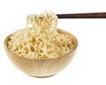 instant noodle in a bowl wooden with chopstick on white background Royalty Free Stock Photo