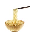 instant noodle in a bowl wooden with chopstick on white background Royalty Free Stock Photo