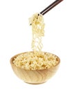 Instant noodle in a bowl wooden with chopstick on white background Royalty Free Stock Photo