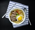 Instant Noodle with fried pork,  pepper and egg in the bowl Royalty Free Stock Photo