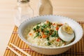 Instant noodles in bowl, Asian fast food on wooden table