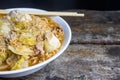 Instant noodles in a bowl of steaming vegetables, eggs, tofu, pork chops are all ready to serve. Royalty Free Stock Photo