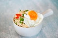 instant noodles cooking tasty eating with bowl, noodles bowl with boiled egg vegetable spring onion and chili on table food,