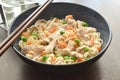 Healthy noodles with pork and vegetables in a bowl.