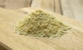 Instant pea soup flakes on wooden cuttingboard