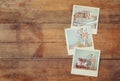 Instant polaroid photos album on wooden background Royalty Free Stock Photo