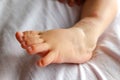 Instep of a baby`s barefoot