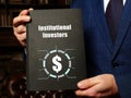 Institutional Investors inscription on the black notepad Royalty Free Stock Photo