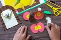 Instruction step 9. Postcard hedgehog with an apple on a wooden table. Handmade. Project of children`s creativity, handicrafts, Royalty Free Stock Photo