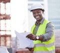 These are instructions for success. Cropped portrait of a handsome young construction worker reading a document while Royalty Free Stock Photo