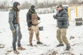 Instructor demonstrate action combat tactical gun shooting to his students