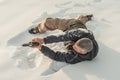 Instructor demonstrate body position of gun shooting on shooting range