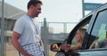 Instructor giving a five to a woman driver sitting in the car while learning to drive on the training ground. Driver Royalty Free Stock Photo