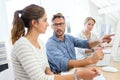 Instructor helping students in computing class Royalty Free Stock Photo