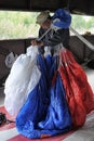 Instructor parachute packs in a backpack before jumping