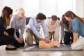 Instructor Performing Resuscitation Technique On Dummy Royalty Free Stock Photo