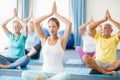 Instructor performing yoga with seniors Royalty Free Stock Photo