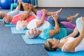 Instructor performing yoga with seniors Royalty Free Stock Photo