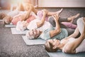 Instructor performing yoga with seniors Royalty Free Stock Photo