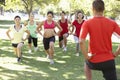 Instructor Running Fitness Boot Camp Royalty Free Stock Photo