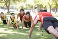 Instructor Running Fitness Boot Camp Royalty Free Stock Photo