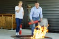 instructor shows how to use fire extinguisher Royalty Free Stock Photo