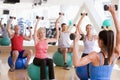 Instructor Taking Exercise Class At Gym Royalty Free Stock Photo