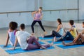 Instructor taking yoga class Royalty Free Stock Photo