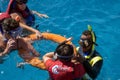 Instructor teaches tourists snorkeling. Active recreation on Red Sea, resort, holidays and adventure, travel. Hurghada, Egypt