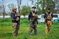 Instructors airsoft players in uniform with weapons before the start of the game Royalty Free Stock Photo