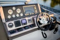 Instrument panel and steering wheel of a motor boat cockpit Royalty Free Stock Photo