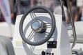 Instrument panel and steering wheel of a motor boat cockpit yacht control bridge