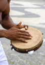 Instrumentalist playing tambourine in the streets of Pelourinho