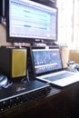 Instruments, machines and laptops from a soundproof music studio