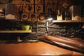 Instruments on wooden wall at footwear workshop.