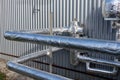 View of the insulated glycol pipelines near to the manufacturing building Royalty Free Stock Photo